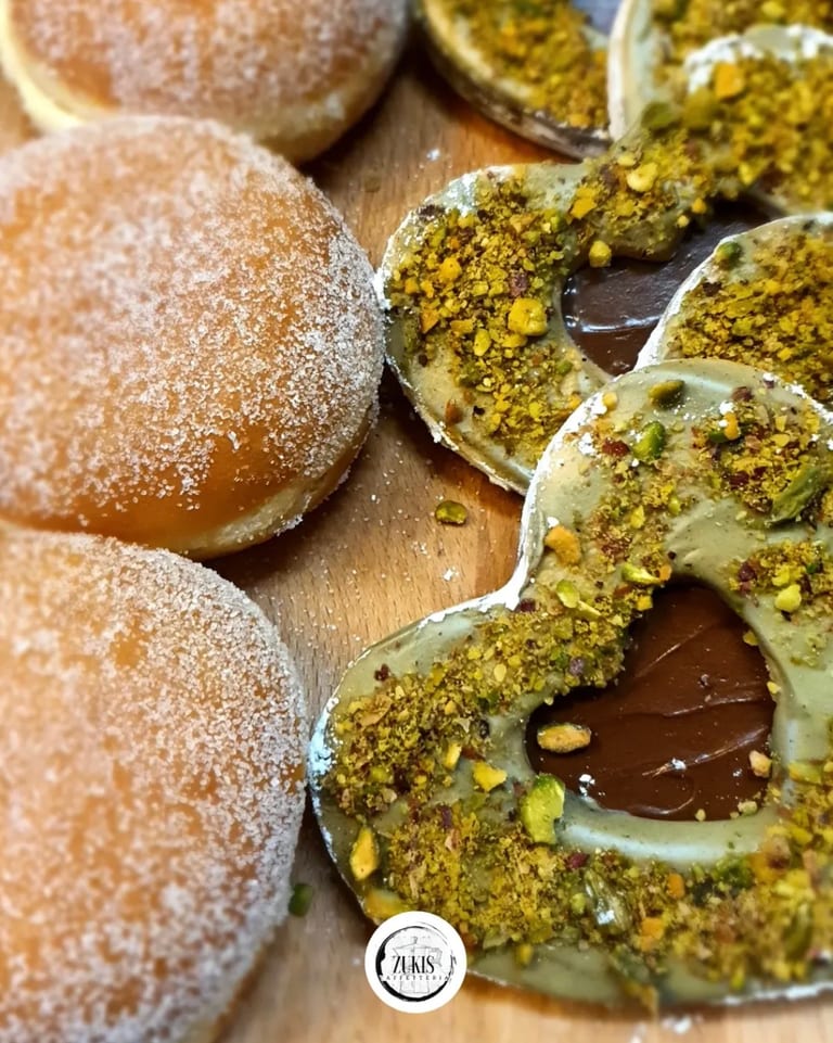 Pistachio-topped bomboloni