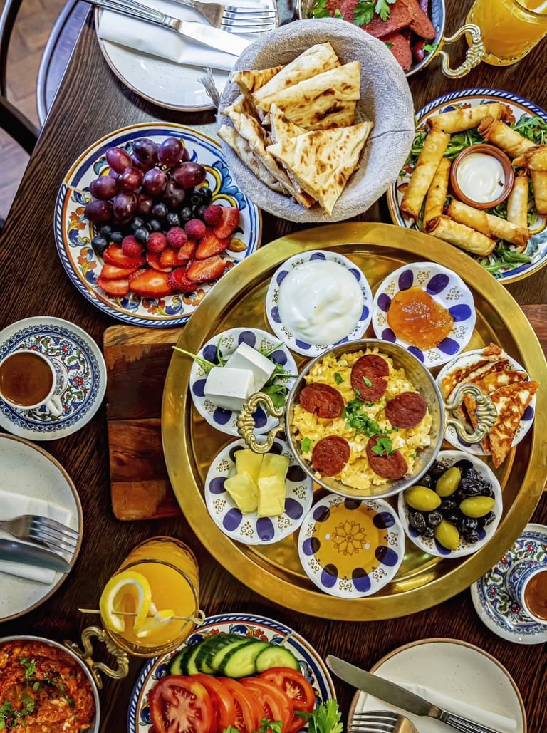 Turkish breakfast spread with sucuk, cheese and olives